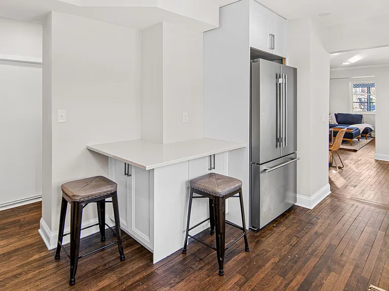 eat-in kitchen and new refrigerator