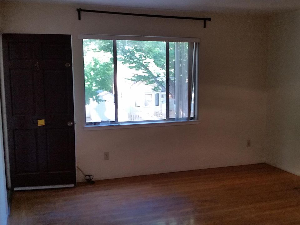 Living room front window and entry door