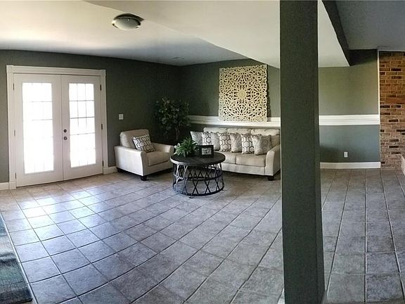 Family room with door leading to patio