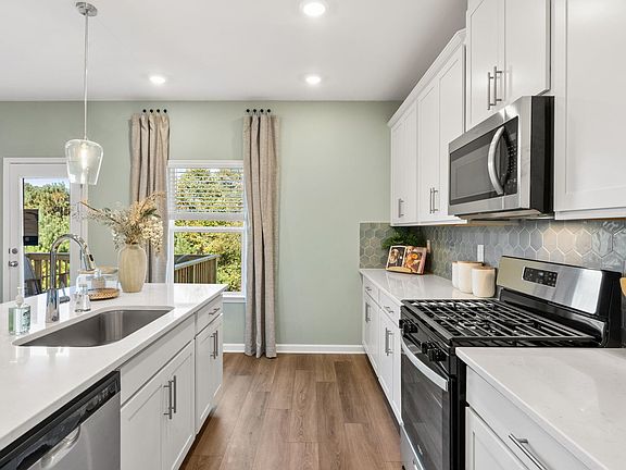 Cook your favorite meals in the stunning, modern kitchen.