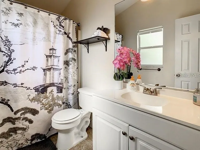 9655 Hollyhill Dr — Photo 3