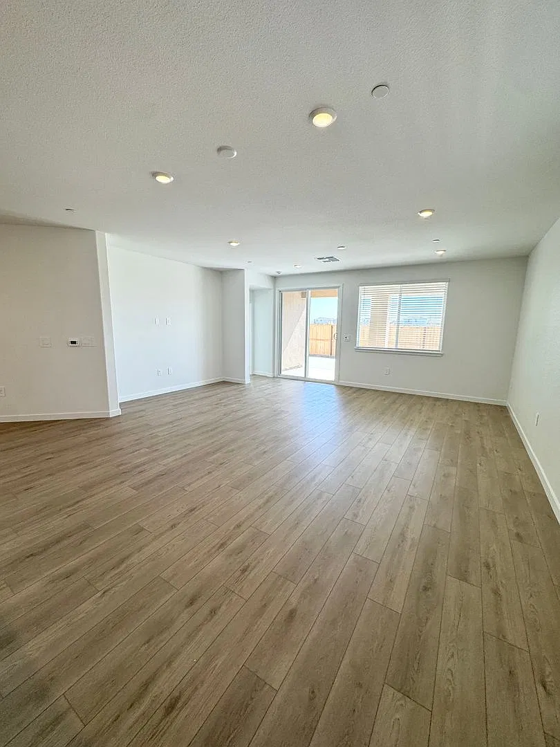 Brand-New Natomas Home! 3 Bedrooms + Loft | Downstairs Primary Suite | Pool & Clubhouse — Photo 4