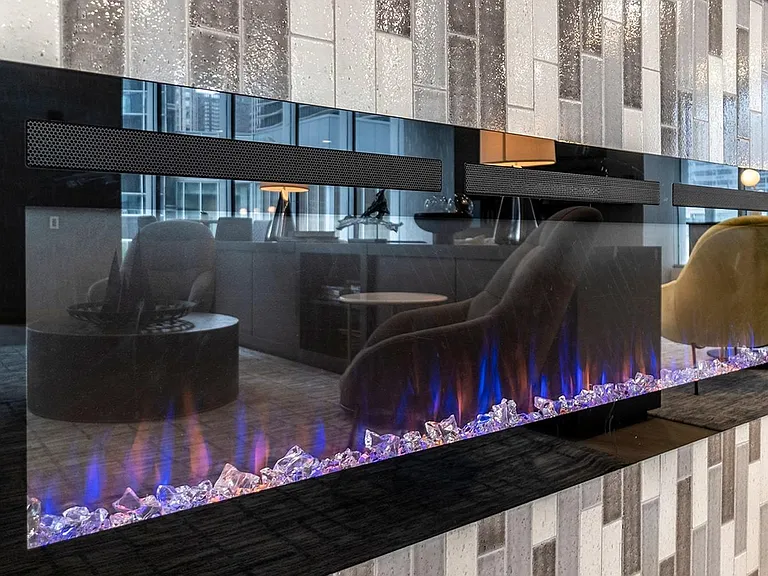 Coast's vibrant fireplace gives the resident lounge a fantastic ambiance