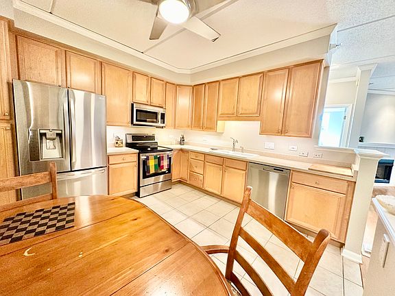 5th image of 445 Village Grn Unit 205