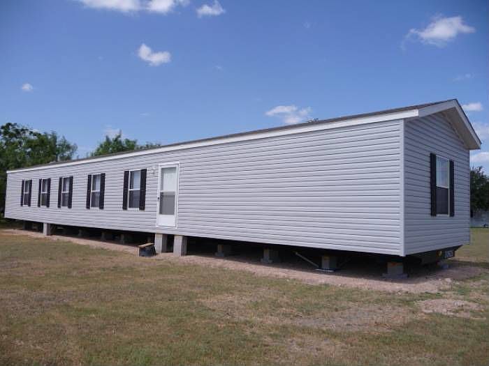 Front View Of Home & Land