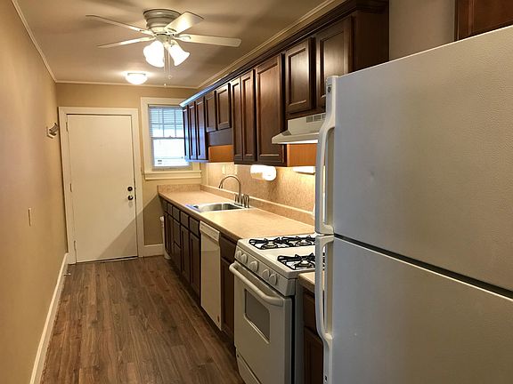 Kitchen has new cabinets, flooring & countertops