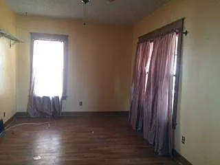 Front Room, old photo, paint color and window covering has c