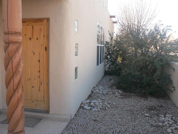 Front door and side of house