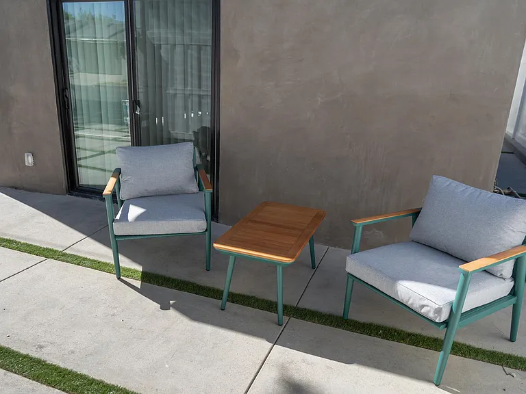 PRIVATE FENCED PATIO WITH OUTDOOR SEATING/FURNITURE
