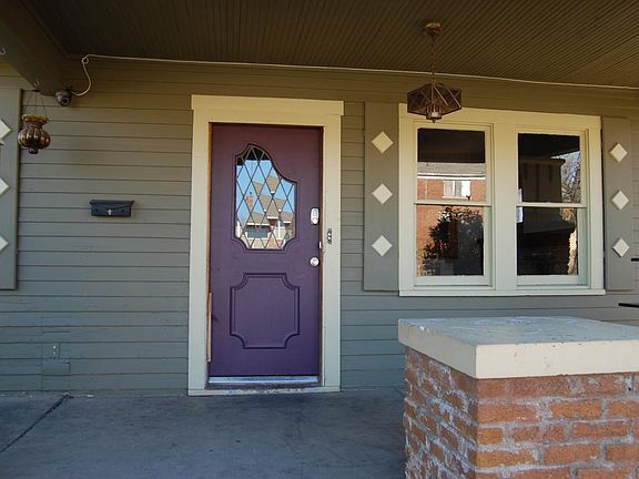 Cute front porch with a space for an outdoor table