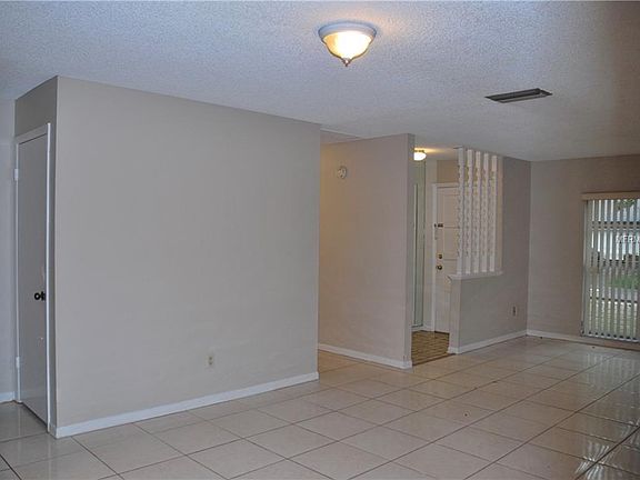 4th image of 9720 Hidden Oaks Cir