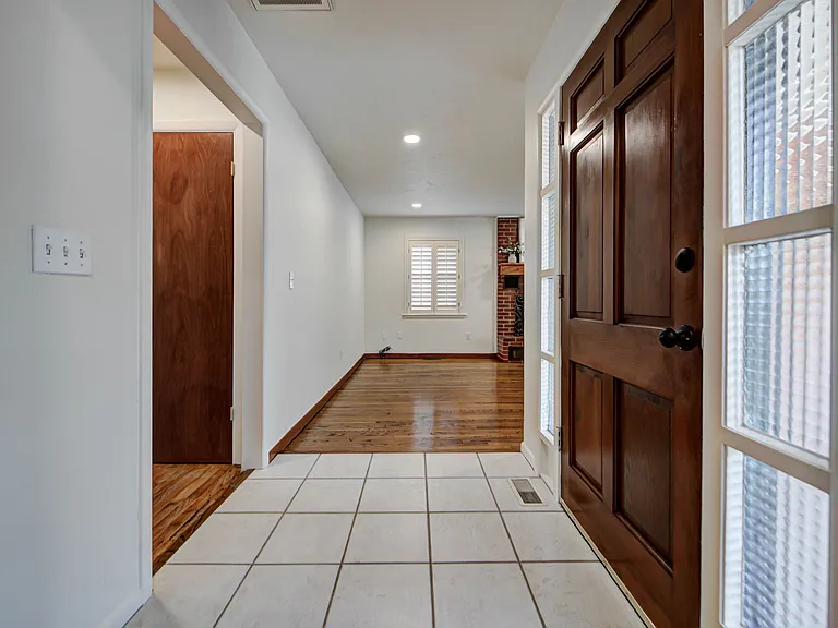 View of Front Door Into The Living Room