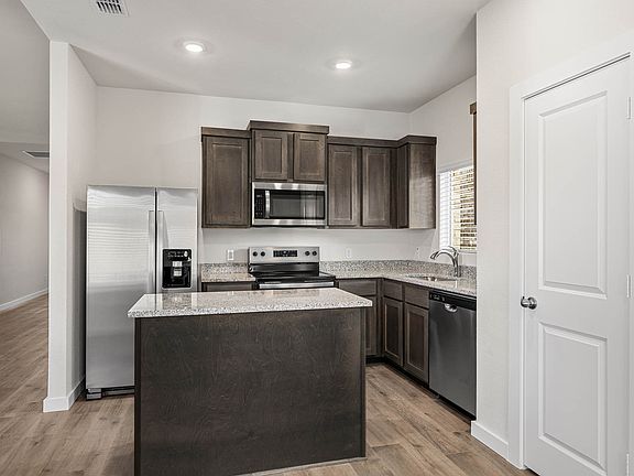 The kitchen has a convenient kitchen island.