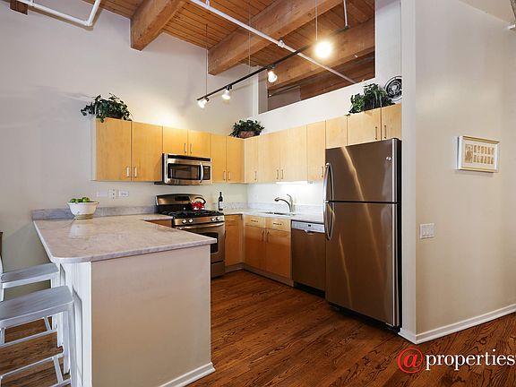 Kitchen with Stainless Appliances & Maple Cabinets