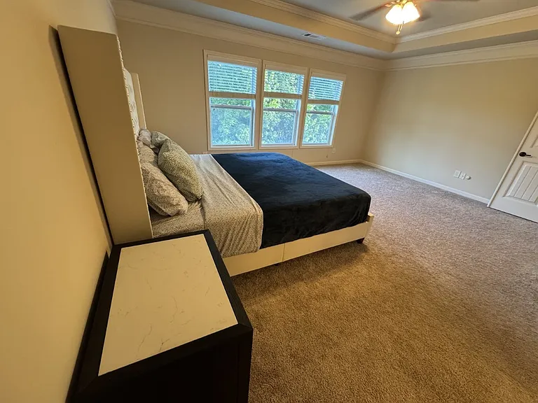 Master bedroom looking toward to the window