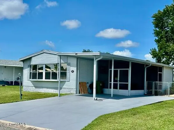 605 Oleander Cir, Barefoot Bay, FL 32976