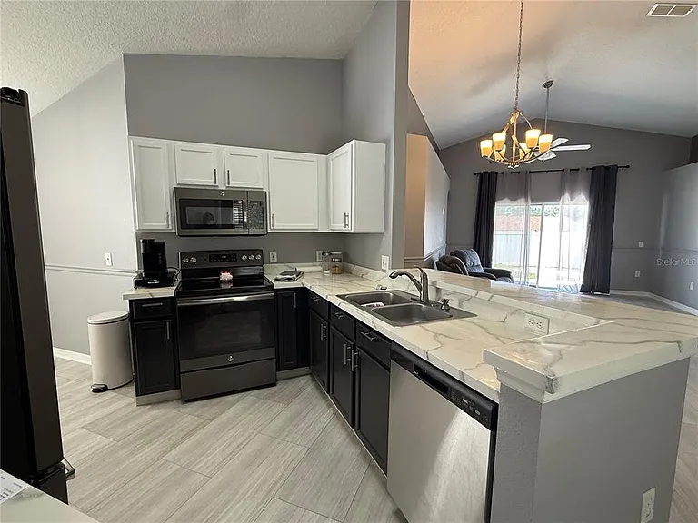 16212 Coopers Hawk Ave — Photo 5