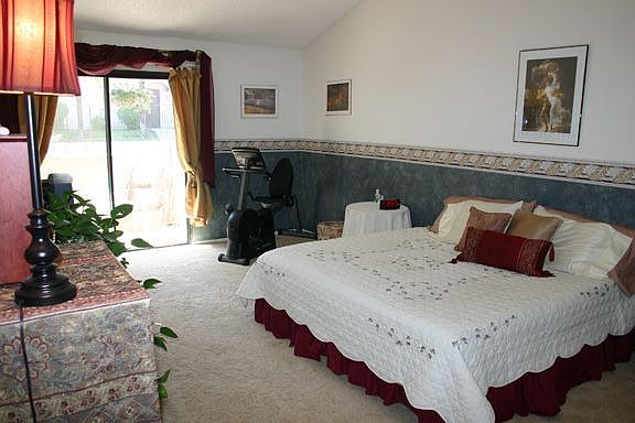 Voluminous Master Bedroom with Valuted Ceiling and Private Balcony