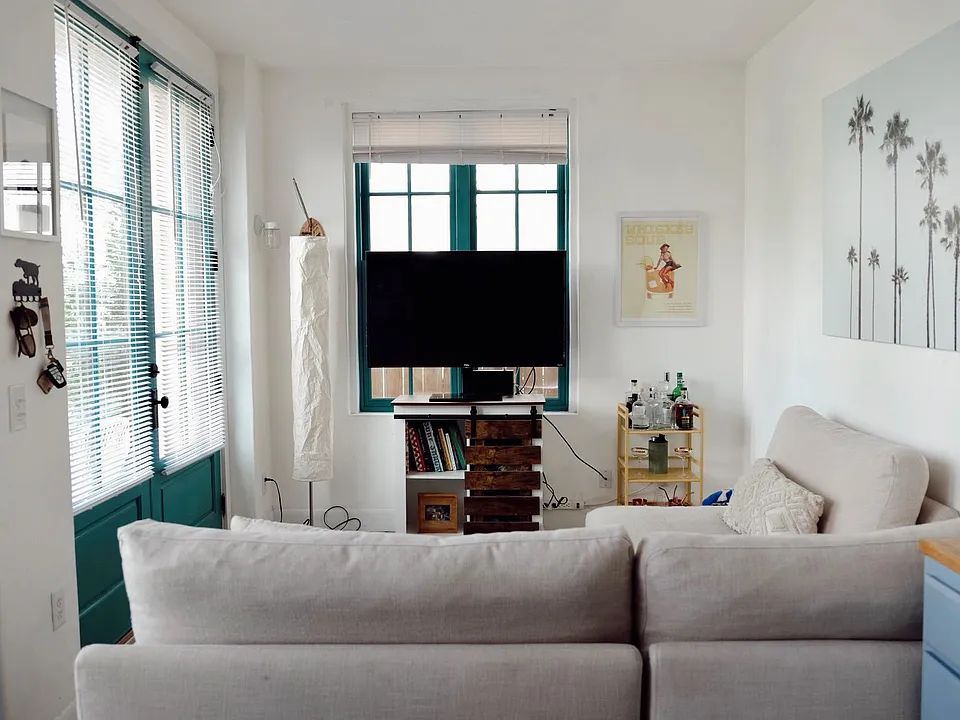 Living room can be utilized as both a dining and media area.