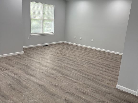 Spacious Living Room with Recessed Lighting