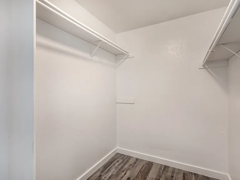 Walk-in closet with built-in shelving