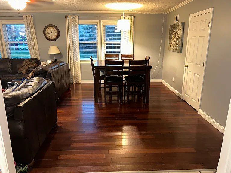 This is a view of the main living space as you enter from the kitchen, two small steps bring you down into this relaxing space.