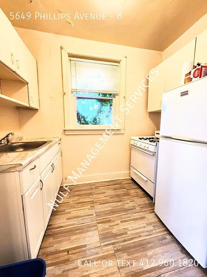 Building Photo - 5649 Phillips Ave #8