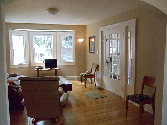 View of living room from dining area.  Also showing large wi