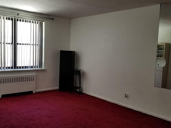 4th image of 3220 92nd St APT 407D
