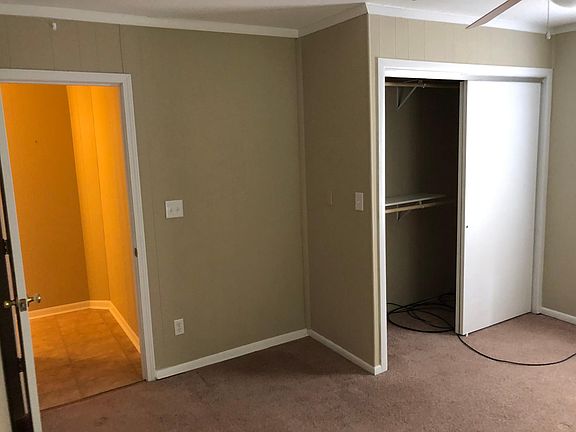 Another Front Bedroom view showing entrance from hallway & large closet. Double-hung closet rods for extra clothes-hanging space.