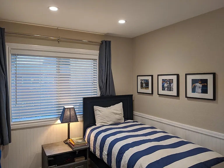 Second bedroom. Wainscotting, recessed lighting.