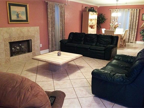 additional view of den that is adjacent to formal dining