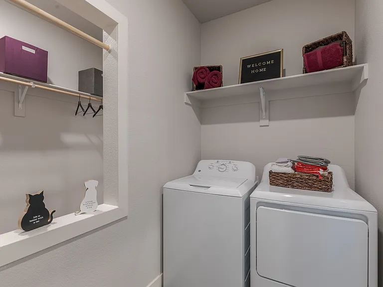 Large Laundry Room With Washer And Dryer