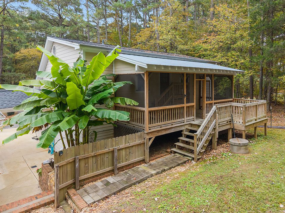 This screened porch offers space to sit outside and relax, read. You may store a bicycle on the porch on one end and set up a table and chairs on the other. Enjoy your personal space.