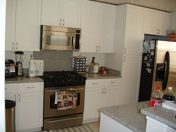 Kitchen with GE Profile stainless steel appliances