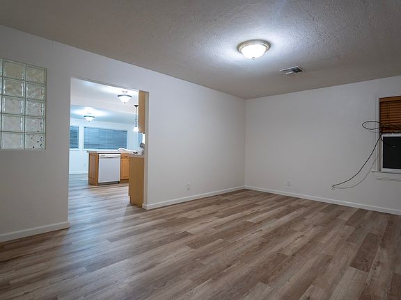 Living room looking into kitchen