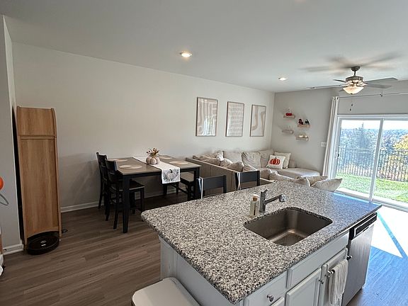 open concept kitchen over the living and dining room