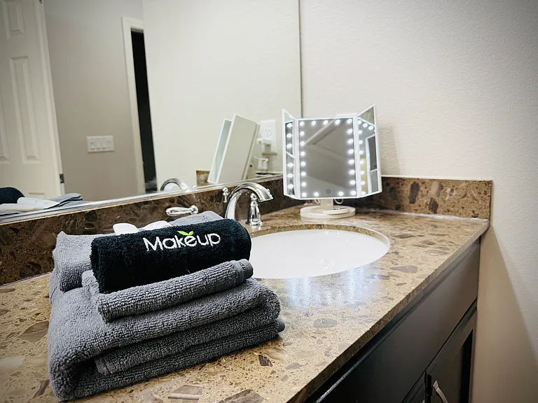 3rd Floor Master Bath has dual sinks, makeup mirror w/ magnification, shower, walk-in closet & more