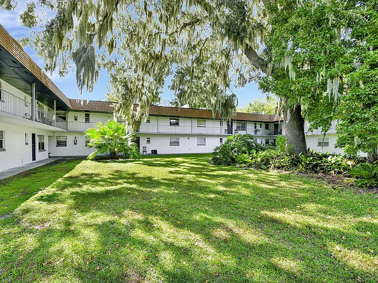 Experience serenity in this beautifully landscaped apartment courtyard.