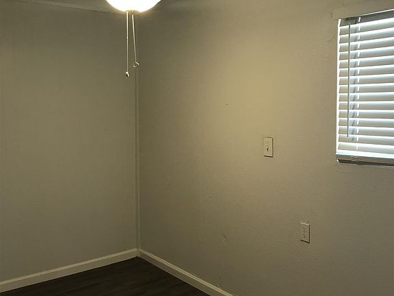 Bedroom #2 with brand new ceiling fan.