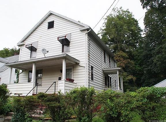 Exterior front with 2 car d...