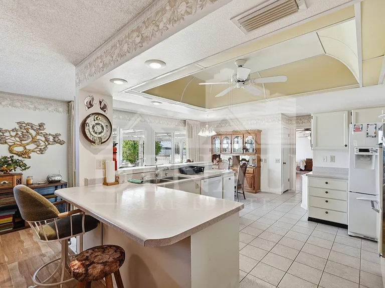 9807 W Mockingbird Dr — Photo 12
