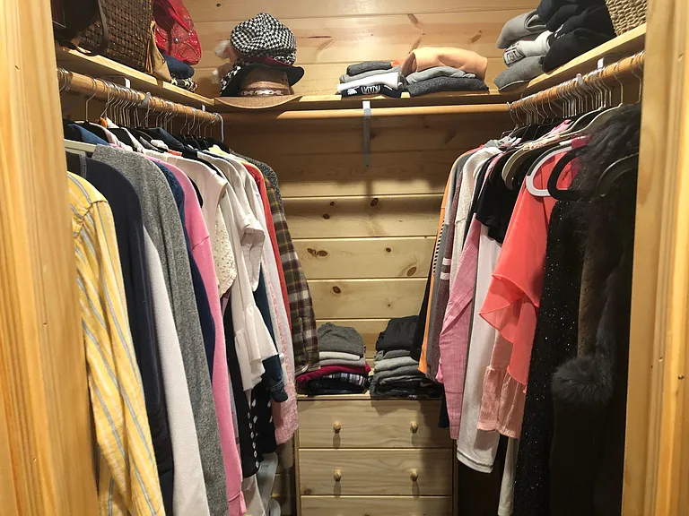 Walk-in closet in bedroom.