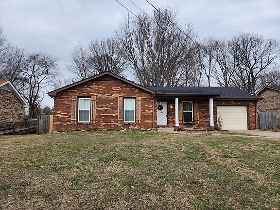 Front yard, antique barnwood shutters installed 2022