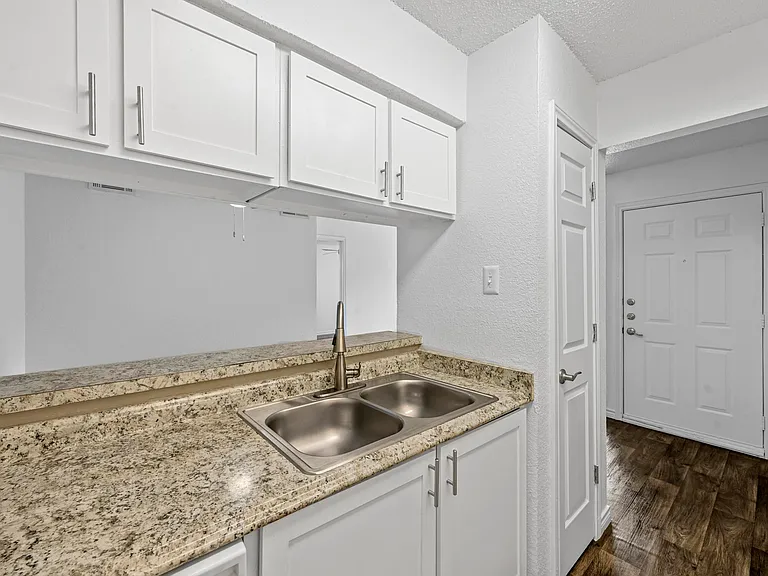 Updated kitchen with beautiful countertops