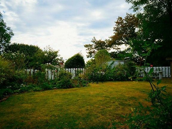 Gorgeous English Gardens in back to enjoy with peak views