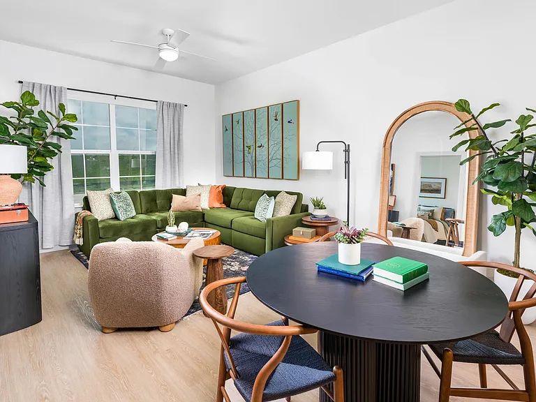 Thoughtfully designed living areas feature wood-style flooring and smart tech for effortless living.