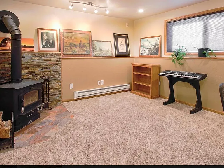 Downstairs living room with wood stove