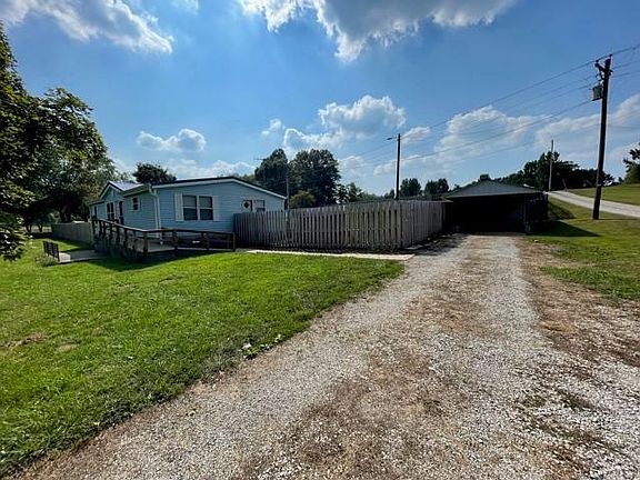 Side view with carport