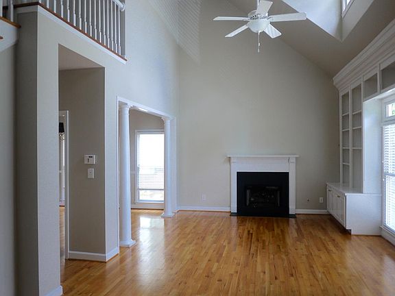 Open floor plan living room with fireplace